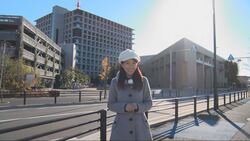 写真：年末情報を伝えるリポーター
